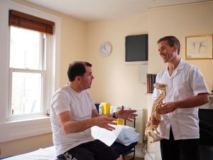 Jay talking to patient during first visit