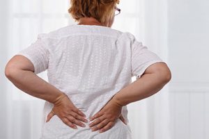 Woman with lower back pain